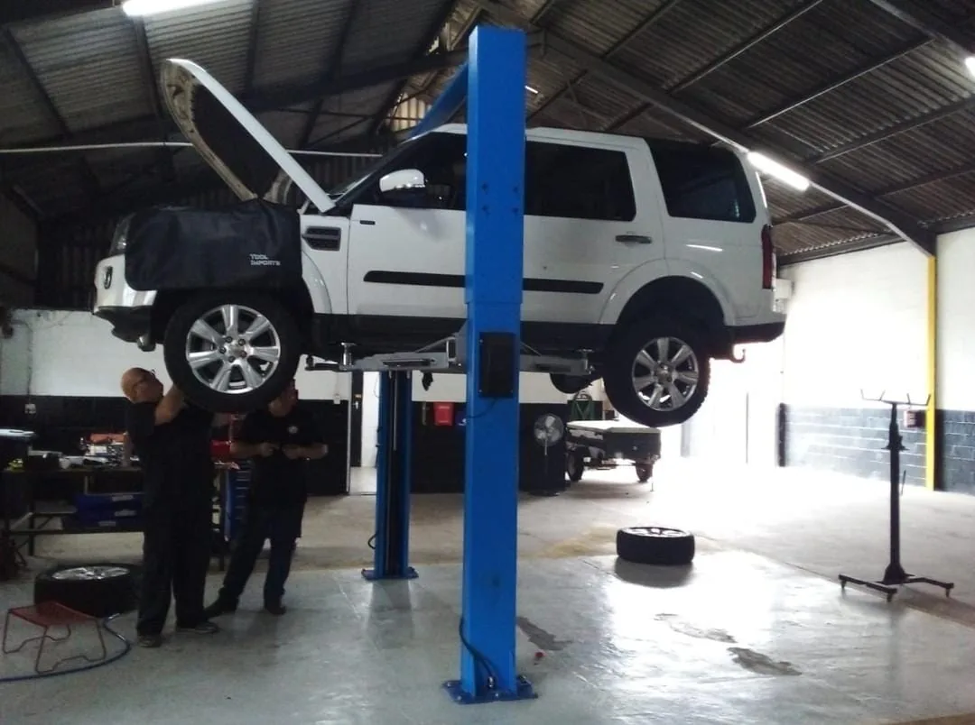 4x4 vehicle raised on a workshop lift at Bullet Auto Service Station